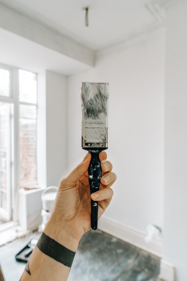 Man doing heavy refurbishment for a property